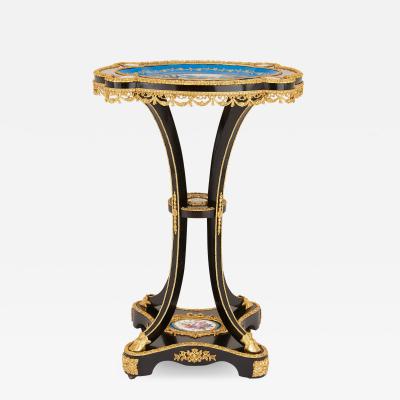 Ormolu mounted S vres porcelain and ebonised wood side table