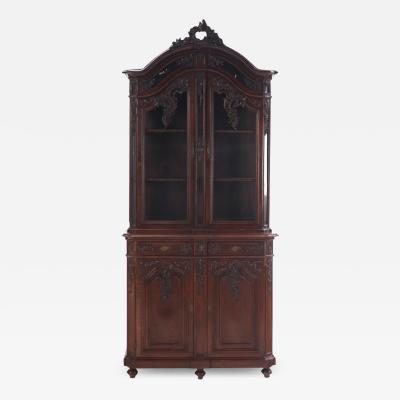 Ornately carved French walnut two piece vitrine C 1880 of high quality 