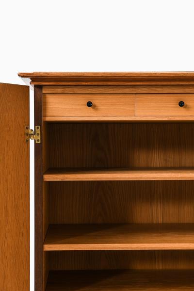 Oscar Nilsson Cabinet in Oak and Brass by Oscar Nilsson 1940s