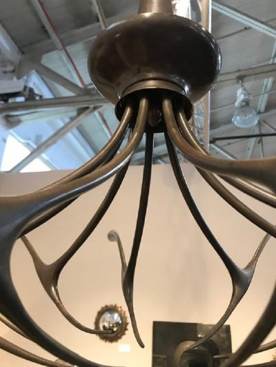 Oscar Torlasco Modernist patinated brass chandelier by Oscar Torlasco