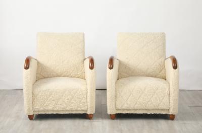 Osvaldo Borsani Osvaldo Borsani Pair of Sheepskin and Oak Lounge Chairs circa 1945