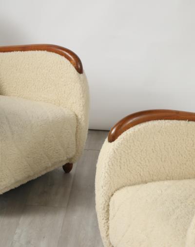 Osvaldo Borsani Osvaldo Borsani Pair of Sheepskin and Oak Lounge Chairs circa 1945