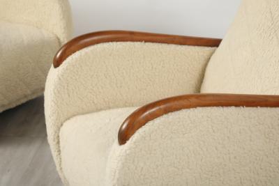 Osvaldo Borsani Osvaldo Borsani Pair of Sheepskin and Oak Lounge Chairs circa 1945