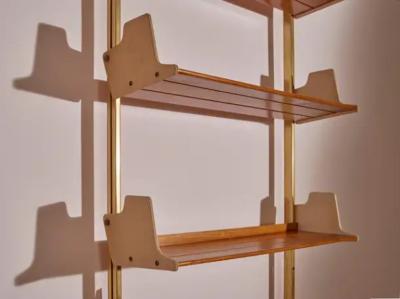 Osvaldo Borsani Osvaldo Borsani anodized aluminum wood and Resinflex E60 bookshelf Italy 1950s