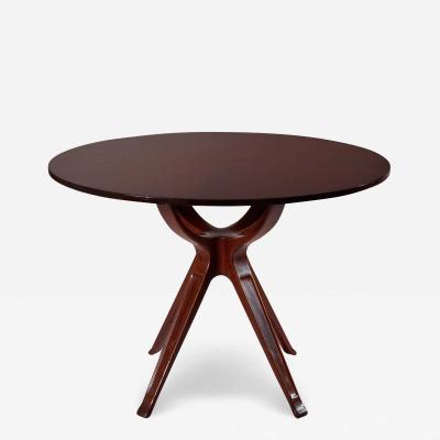 Osvaldo Borsani Osvaldo Borsani mahogany round dining table Italy 1950s