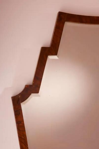 Osvaldo Borsani Osvaldo Borsani mirror with walnut frame and shaped mirrored glass Italy 1940s