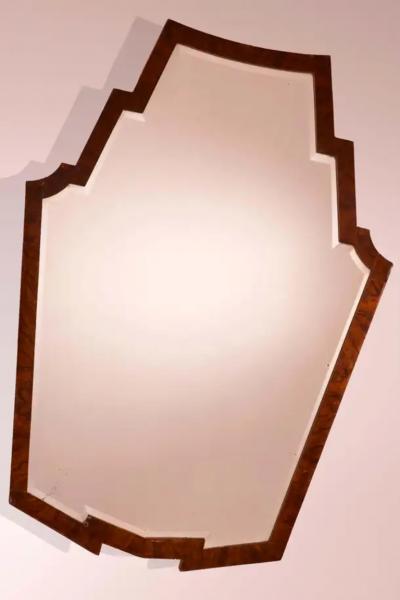 Osvaldo Borsani Osvaldo Borsani mirror with walnut frame and shaped mirrored glass Italy 1940s