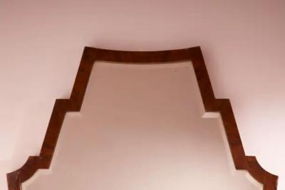 Osvaldo Borsani Osvaldo Borsani mirror with walnut frame and shaped mirrored glass Italy 1940s