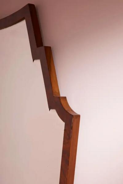 Osvaldo Borsani Osvaldo Borsani mirror with walnut frame and shaped mirrored glass Italy 1940s
