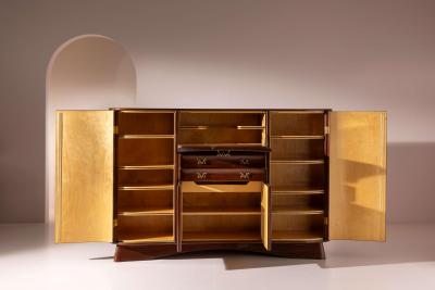 Osvaldo Borsani Osvaldo Borsani oak cabinet with doors drawers drop front panel Italy 1945