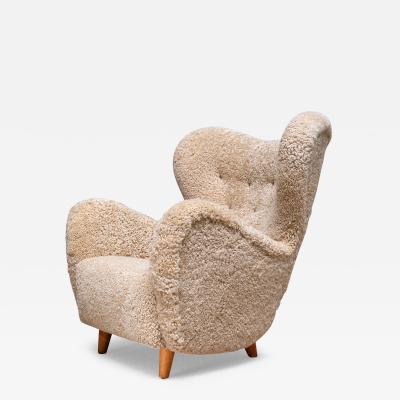 Otto Schulz Otto Schulz Wingback Chair in Sheepskin and Birch BOET Sweden 1946