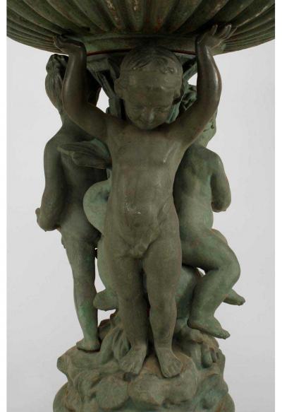 Outdoor Continental style painted iron fountain with triple cupid and dolphin ba
