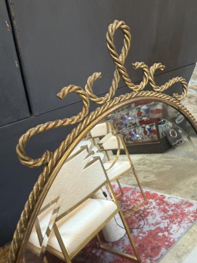 Oval Brass Vanity Mirror with Decorative Frame