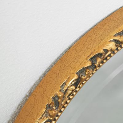 Oval Mirror in Gold Painted Wood 1960s