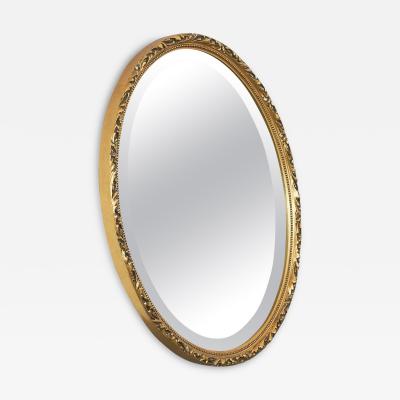 Oval Mirror in Gold Painted Wood 1960s