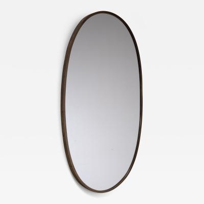 Oval brass wall mirror