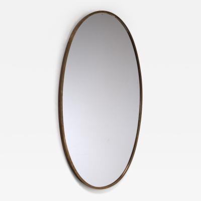Oval brass wall mirror