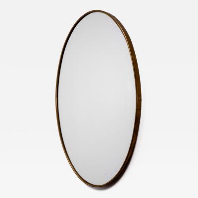 Oval brass wall mirror