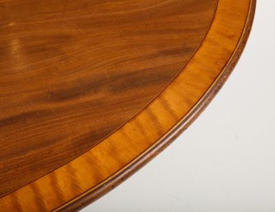 Oval mahogany breakfast table banded in satinwood 