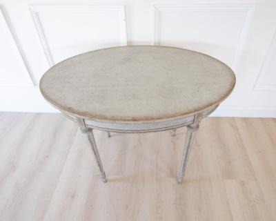 Oval table in the Gustavian style is finished in grey