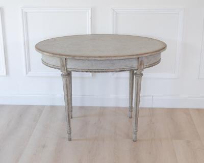 Oval table in the Gustavian style is finished in grey