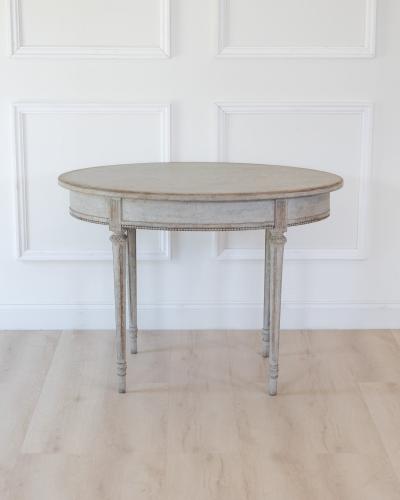 Oval table in the Gustavian style is finished in grey