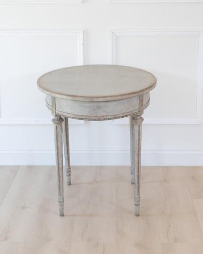 Oval table in the Gustavian style is finished in grey
