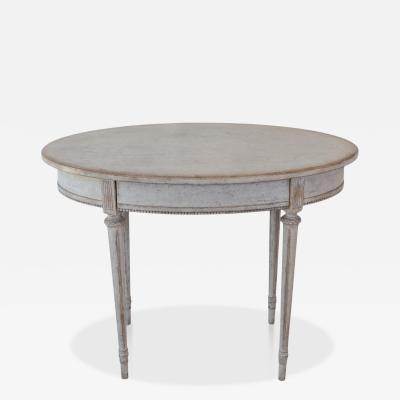 Oval table in the Gustavian style is finished in grey