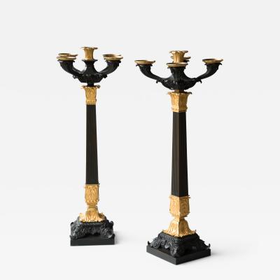 PAIR FIVE ARM LOUIS PHILIP PATINATED AND GILT BRONZE CANDELABRA Circa 1840