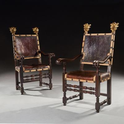 PAIR OF 17TH CENTURY ITALIAN BAROQUE PARCEL GILT WALNUT LEATHER ARMCHAIRS