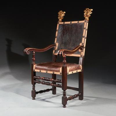 PAIR OF 17TH CENTURY ITALIAN BAROQUE PARCEL GILT WALNUT LEATHER ARMCHAIRS