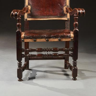 PAIR OF 17TH CENTURY ITALIAN BAROQUE PARCEL GILT WALNUT LEATHER ARMCHAIRS