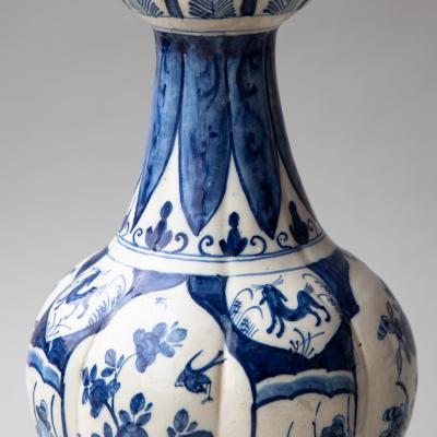 PAIR OF 18TH CENTURY DUTCH DELFT BLUE AND WHITE WAISTED BOTTLE VASE