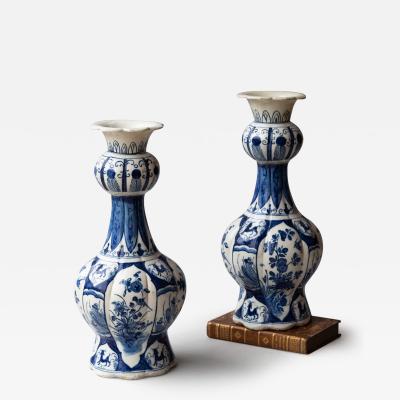 PAIR OF 18TH CENTURY DUTCH DELFT BLUE AND WHITE WAISTED BOTTLE VASE
