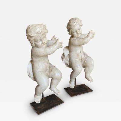 PAIR OF 18TH CENTURY ITALIAN PUTTI
