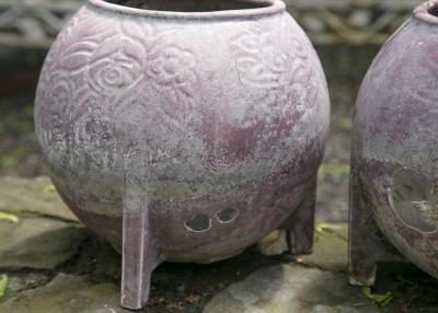 PAIR OF 1920S FRENCH CAST IRON JARDINIERES WITH ORIGINAL PURPLE PAINT