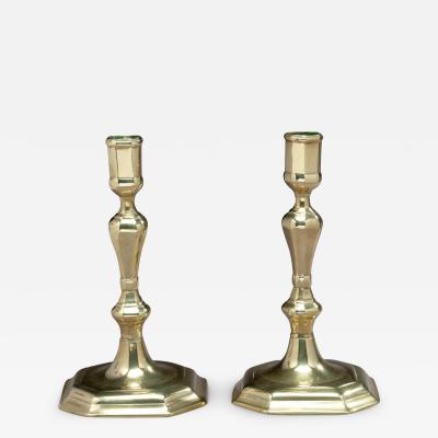 PAIR OF BRASS CANDLESTICKS WITH AN OCTAGONAL BASE