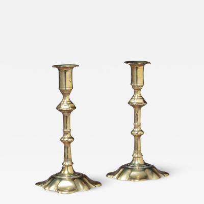 PAIR OF BRASS CANDLESTICKS WITH PETAL BASES