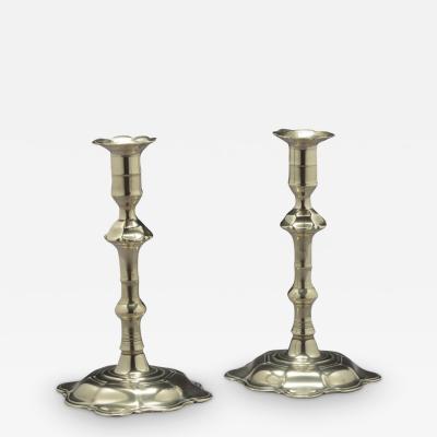PAIR OF BRASS CANDLESTICKS WITH PETAL BASES