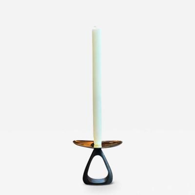 PAIR OF CANDLE HOLDERS WITH PATINATED TRIANGULAR BASE AND POLISHED TOP