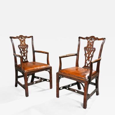 PAIR OF CHIPPENDALE STYLE MAHOGANY AND LEATHER ARMCHAIRS