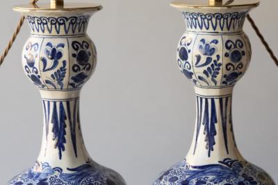 PAIR OF DUTCH DELFT BLUE AND WHITE WAISTED BOTTLE VASES CONVERTED TO LAMPS