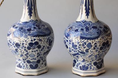 PAIR OF DUTCH DELFT BLUE AND WHITE WAISTED BOTTLE VASES CONVERTED TO LAMPS