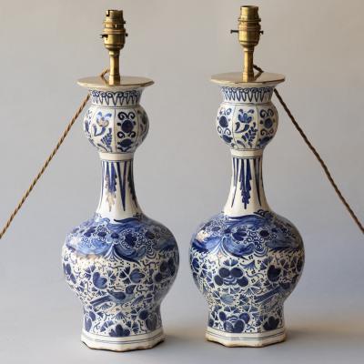 PAIR OF DUTCH DELFT BLUE AND WHITE WAISTED BOTTLE VASES CONVERTED TO LAMPS