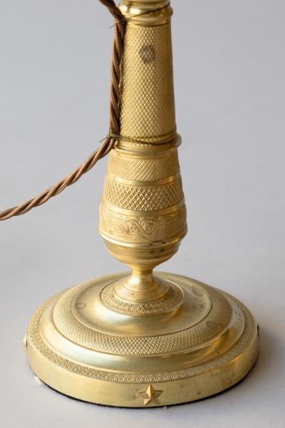 PAIR OF EARLY 19TH CENTURY GILT BRONZE CANDLESTICKS CONVERTED TO TABLE LAMPS