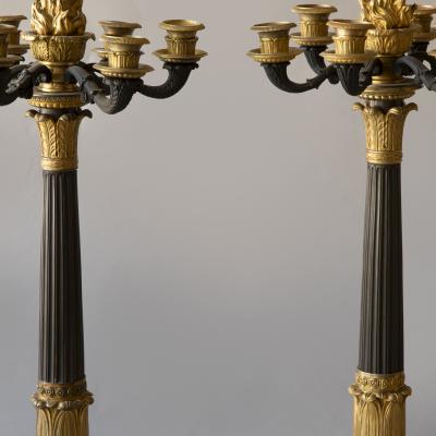 PAIR OF EARLY 19TH CENTURY PATINATED AND GILT BRONZE SIX LIGHT CANDELABRA