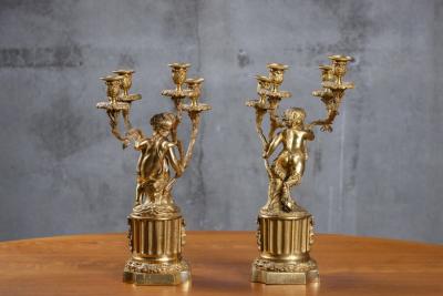 PAIR OF FRENCH DOR BRONZE CHERUB CANDELABRAS