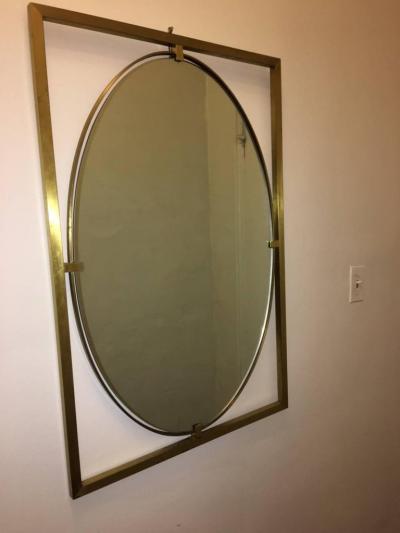 PAIR OF ITALIAN MODERN FLOATING OVAL BRASS MIRRORS