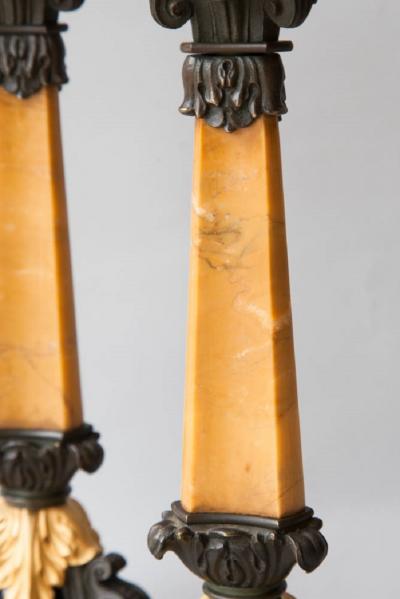 PAIR OF MARBLE PATINATED BRONZE AND GILT BRONZE CANDLESTICKS