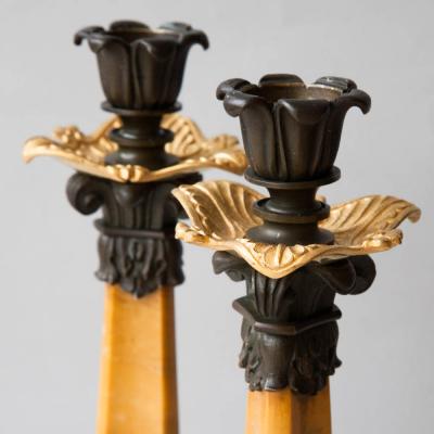 PAIR OF MARBLE PATINATED BRONZE AND GILT BRONZE CANDLESTICKS